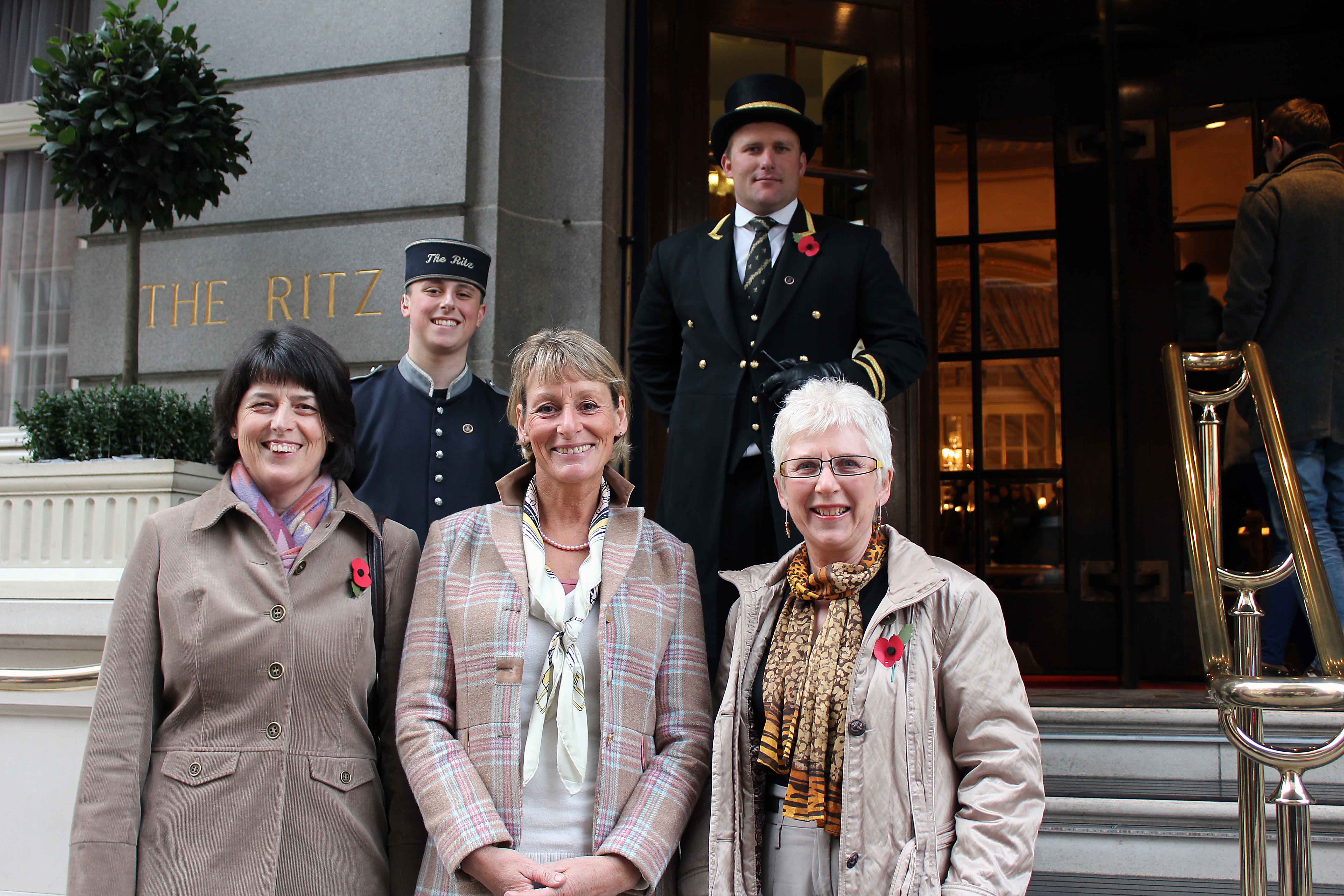 Rosemary with her guest and the legendary Mary King outside the Ritz Hotel in London